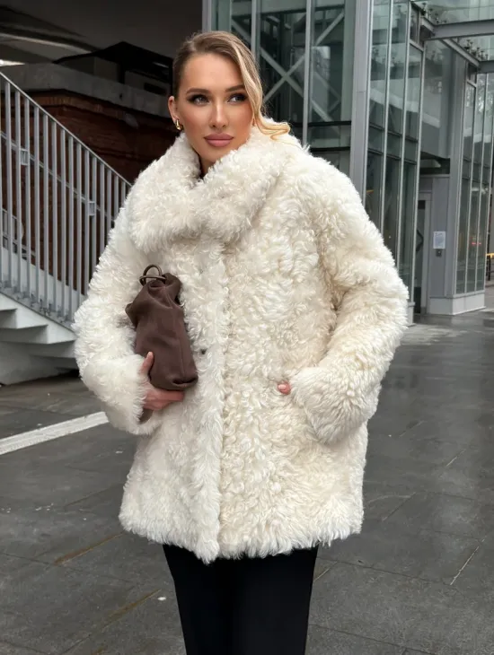 Белая шубка из тиградо - фото 12